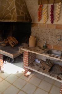 Kuchyň nebo kuchyňský kout v ubytování Casa rural La bodega + 22 fotografií