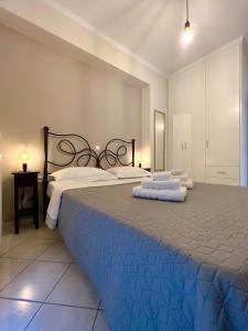 Ένα ή περισσότερα κρεβάτια σε δωμάτιο στο Angelland Luxury Suites