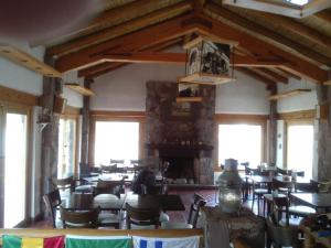 מסעדה או מקום אחר לאכול בו ב-El Refugio de Coquena
