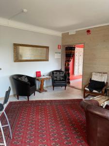 Ruang duduk di Kolmårdsgården B&B