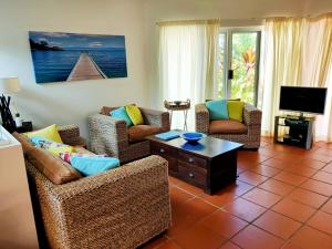 Μια τηλεόραση ή/και κέντρο ψυχαγωγίας στο Beaches Apt 2