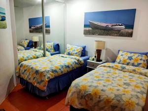 Ένα ή περισσότερα κρεβάτια σε δωμάτιο στο Beaches Apt 2 +15 φωτογραφίες