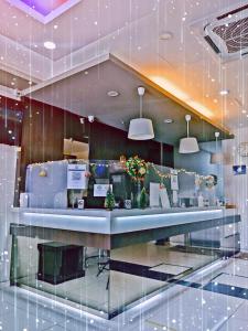 a lobby of a store with a checkout counter at Royale Hotel Batu Gajah in Ipoh