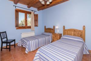 Postel nebo postele na pokoji v ubytování Ruralracons + 23 fotografií