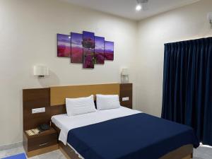 Hotel Agni 객실 침대