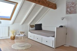 Ένα ή περισσότερα κρεβάτια σε δωμάτιο στο bel appartement dans la montagne, L'orée du Bois