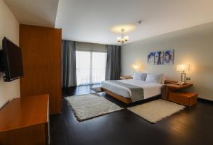 Voodi või voodid majutusasutuse Royal Maadi Hotel toas