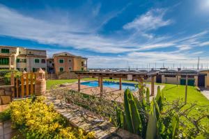 Bazén v ubytování Ideal Property Mallorca - Blau Mari nebo v jeho okolí