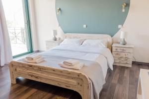 Postel nebo postele na pokoji v ubytování Island Apartments