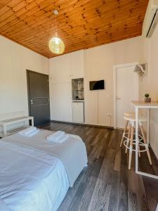 Postel nebo postele na pokoji v ubytování Island Apartments