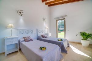 Posteľ alebo postele v izbe v ubytovaní Ideal Property Mallorca - Brivo