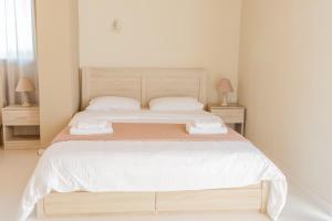 Postel nebo postele na pokoji v ubytování Island Apartments