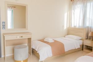 Postel nebo postele na pokoji v ubytování Island Apartments
