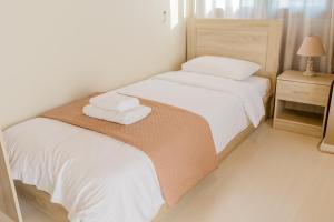 Postel nebo postele na pokoji v ubytování Island Apartments