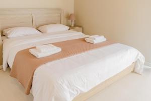 Postel nebo postele na pokoji v ubytování Island Apartments