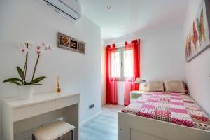 Ένα ή περισσότερα κρεβάτια σε δωμάτιο στο Galindo - Casa Victor