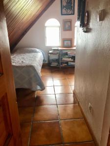 Postel nebo postele na pokoji v ubytování L'Es-sens-ciel