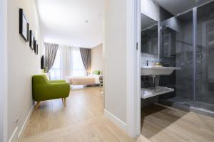 A bathroom at Alma Suites