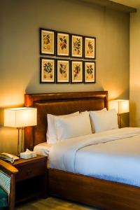 Ein Bett oder Betten in einem Zimmer der Unterkunft Lemon Lodges By Roomy, Nathiagali