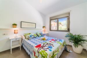 Łóżko lub łóżka w pokoju w obiekcie Ideal Property Mallorca - Gaviotas