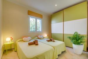 Postel nebo postele na pokoji v ubytování Ideal Property Mallorca - Adelfa