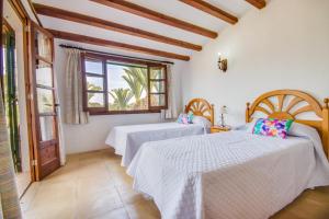 Voodi või voodid majutusasutuse Ideal Property Mallorca - Can Comaro toas