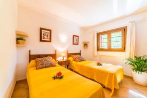 Postel nebo postele na pokoji v ubytování Ideal Property Mallorca - Casa Tenis