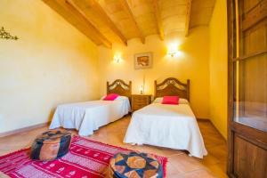 Postel nebo postele na pokoji v ubytování Ideal Property Mallorca - Can Nyany Buger