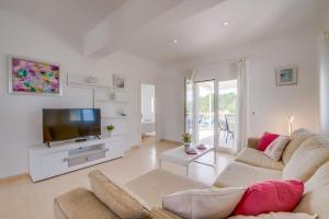 Μια τηλεόραση ή/και κέντρο ψυχαγωγίας στο Ideal Property Mallorca - Puesta de Sol