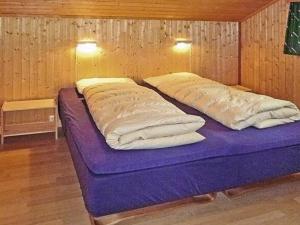 two pillows on a bed in a room at 6 person holiday home in olden-By Traum in Olden