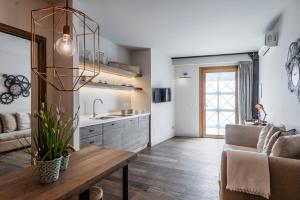 Kuchyňa alebo kuchynka v ubytovaní Ferrini Home - Piazza Trento