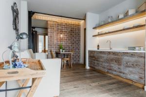 Kuchyňa alebo kuchynka v ubytovaní Ferrini Home - Piazza Trento