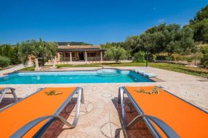 an image of a villa with a swimming pool at Ideal Property Mallorca - Ses Comes in Selva