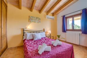 Postel nebo postele na pokoji v ubytování Ideal Property Mallorca - Sort + 37 fotografií