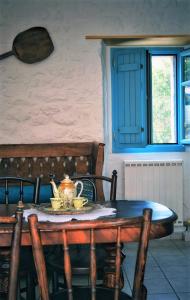 Posedenie v ubytovaní Lithos Stone Suites