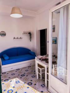 A bed or beds in a room at Nido del Sole Ischia