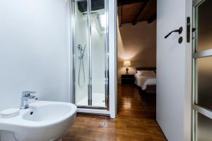 Posteľ alebo postele v izbe v ubytovaní Ferrini Home - Piazza Trento