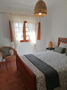 En eller flere senge i et værelse på Apartamento Riomar