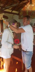 a man and a woman standing next to each other at Ambadi's villa -Lake view resort in Pallipuram +37 photos
