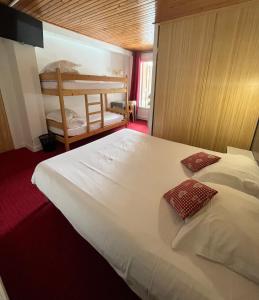 Cama o camas de una habitación en Le Rocher Du Cerf