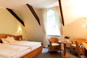 Katil atau katil-katil dalam bilik di Hotel Altes Stadthaus