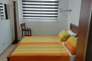 Voodi või voodid majutusasutuse Jays Apartment - Colombo 02 at the heart of convenience toas