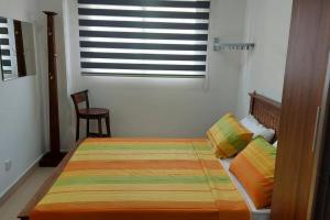 Voodi või voodid majutusasutuse Jays Apartment - Colombo 02 at the heart of convenience toas