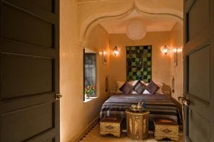 Postel nebo postele na pokoji v ubytování Riad Papillon by Marrakech Riad