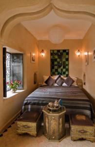Postel nebo postele na pokoji v ubytování Riad Papillon by Marrakech Riad