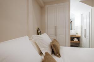 Posteľ alebo postele v izbe v ubytovaní La Sillería de Triana by Magno Apartments