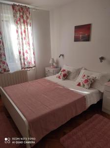 Postel nebo postele na pokoji v ubytování Kuća za odmor MANA
