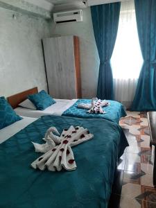 Postel nebo postele na pokoji v ubytování Tokaplus