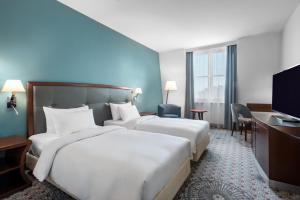 Postel nebo postele na pokoji v ubytování Radisson Blu Hotel Wroclaw