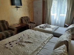 Postel nebo postele na pokoji v ubytování Tokaplus